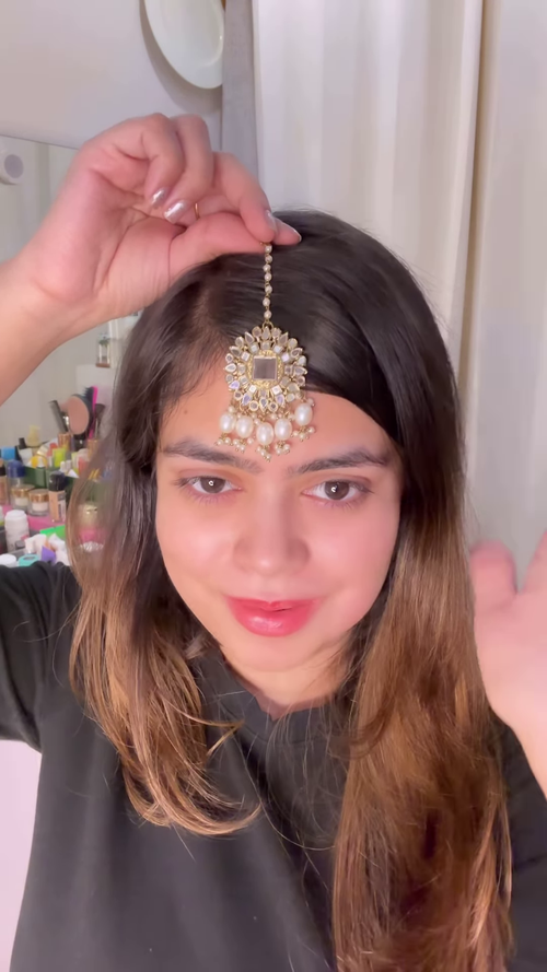 Elegant Gold-Toned Jhumka Earrings with Kundan and Multi-Strand Pearl Earchain