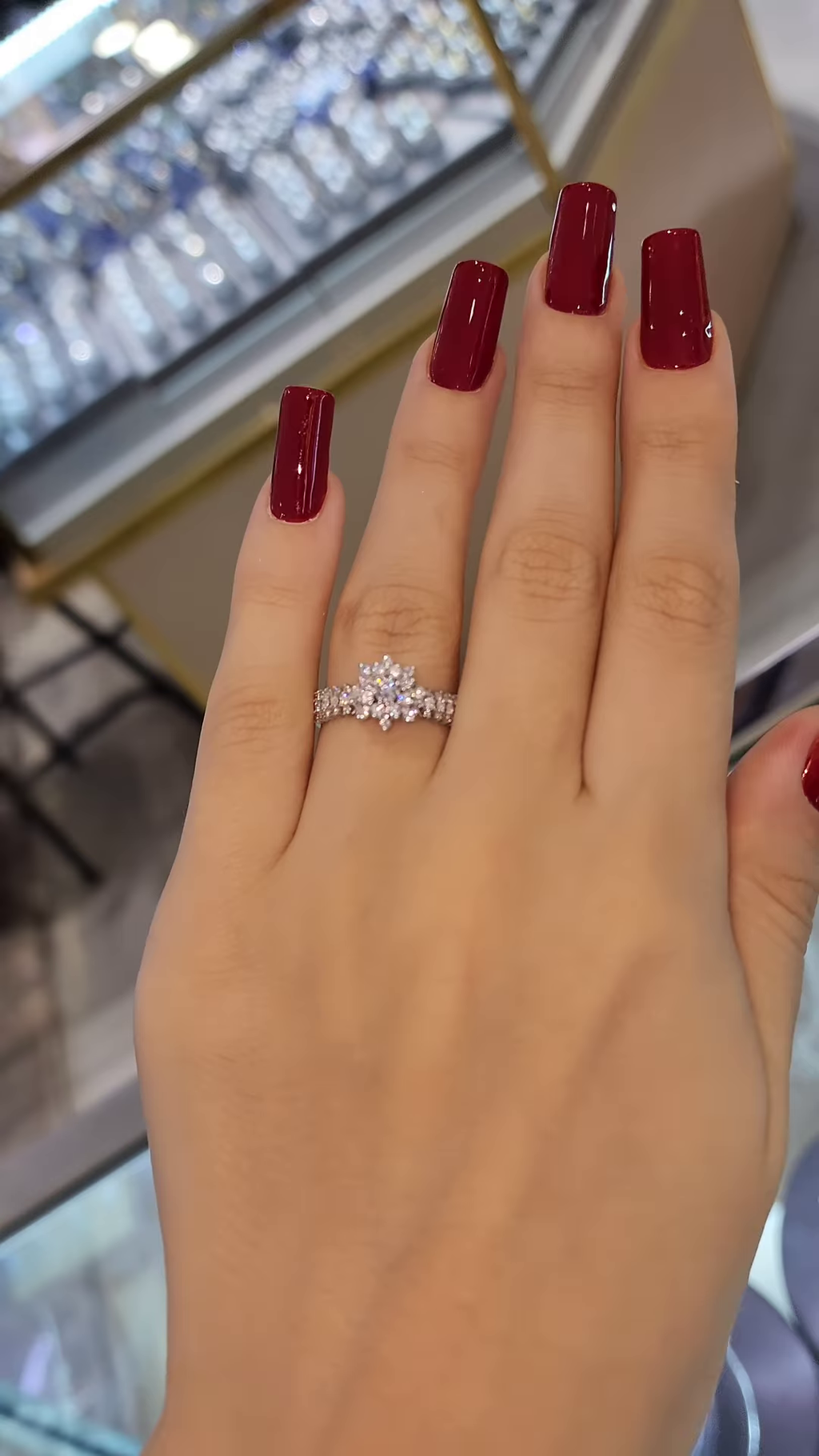 Dazzling Floral Halo Engagement Ring with Pave Band