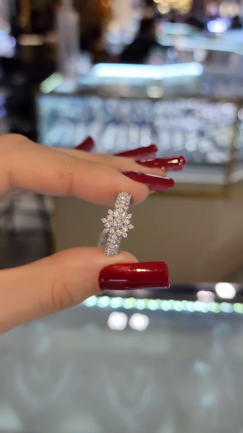 Dazzling Floral Halo Engagement Ring with Pave Band