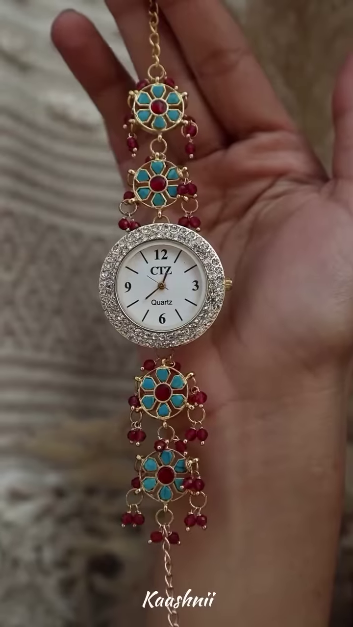 Whimsical Gold-Toned Wristwatch with Crescent Moon and Pearl Accents – Celestial Timepiece