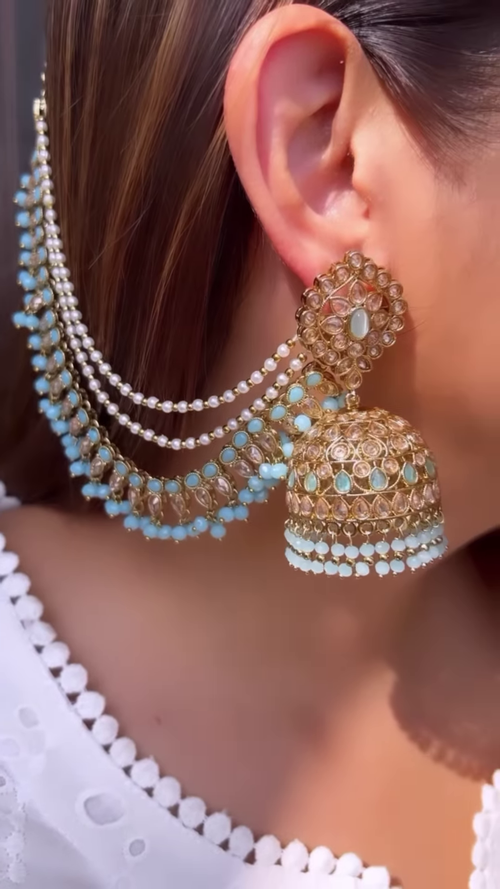 Dazzling Silver-Toned Jhumka Earrings with Multiple Chains and Pearl Embellishments
