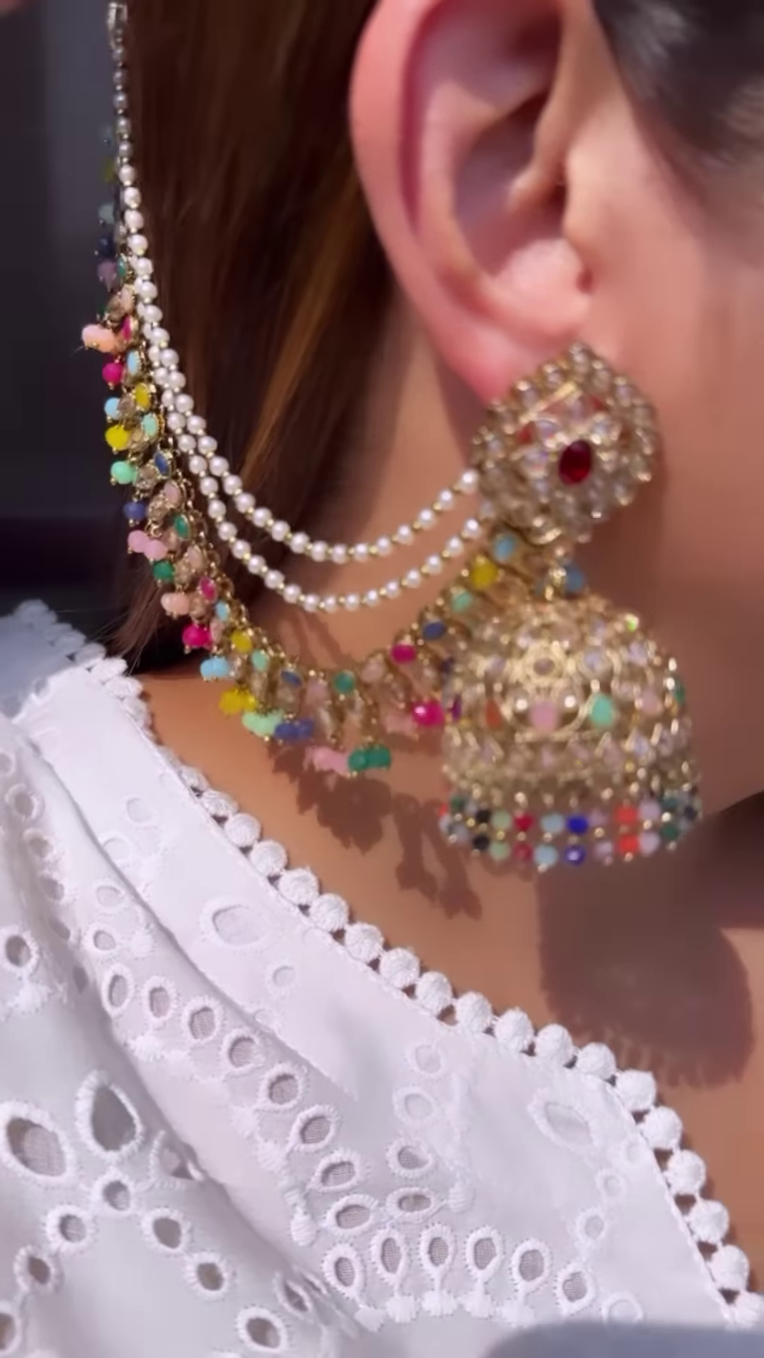 Dazzling Silver-Toned Jhumka Earrings with Multiple Chains and Pearl Embellishments