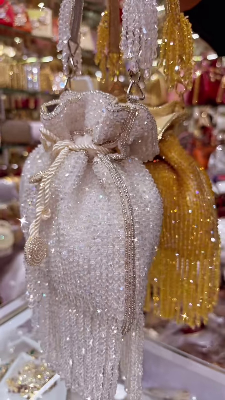 Exquisite White Beaded Potli Bag with Sparkling Embellishments and Tasseled Drawstring