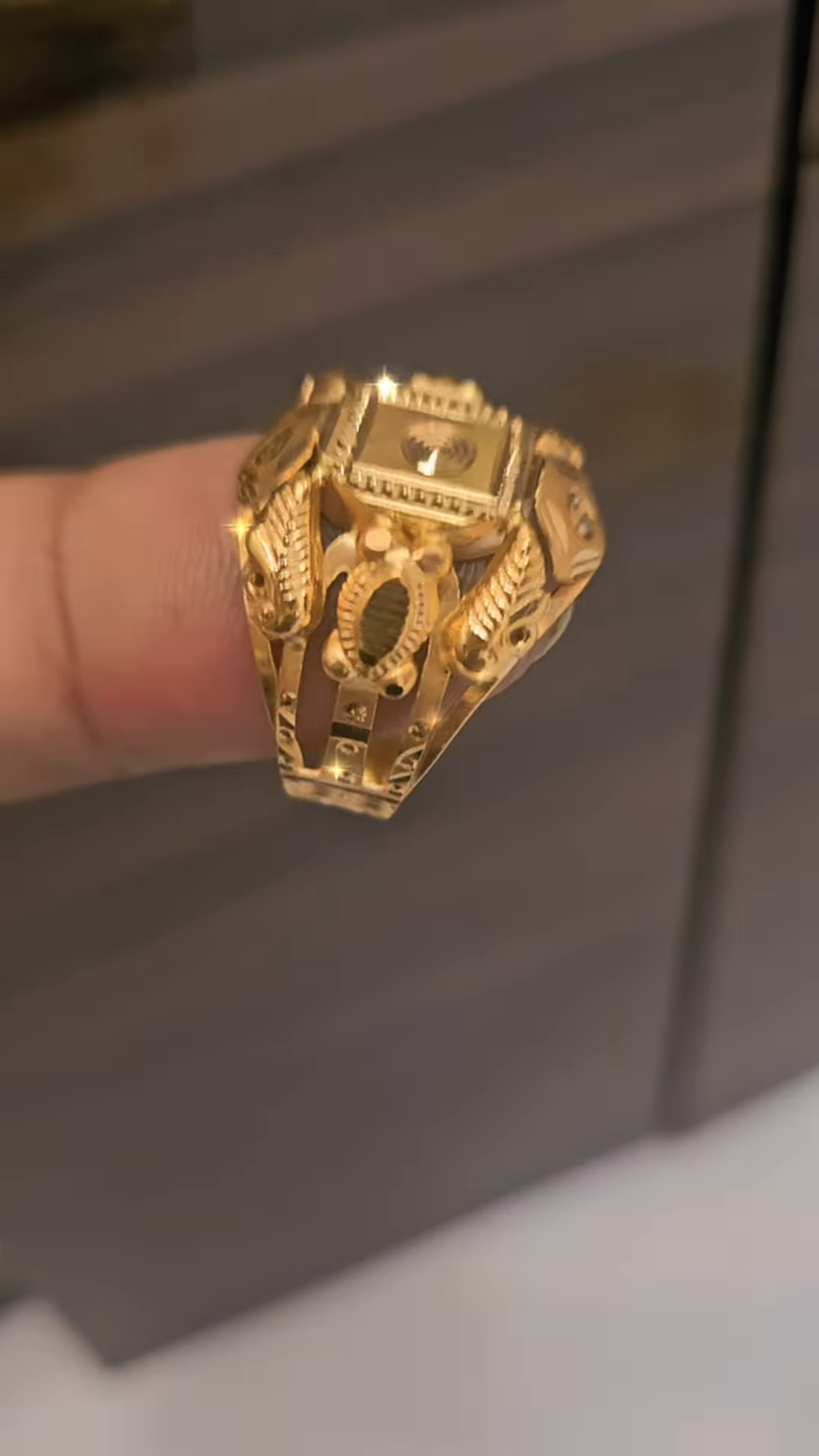 Bold Gold-Toned Ring with Textured and Patterned Design