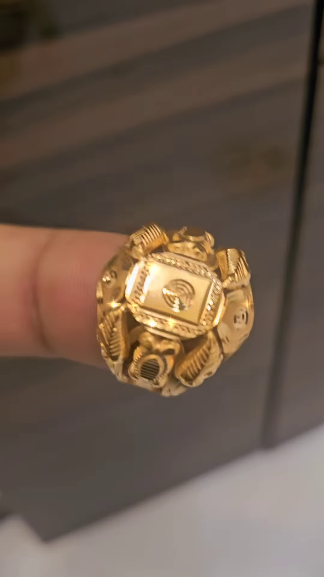 Bold Gold-Toned Ring with Textured and Patterned Design