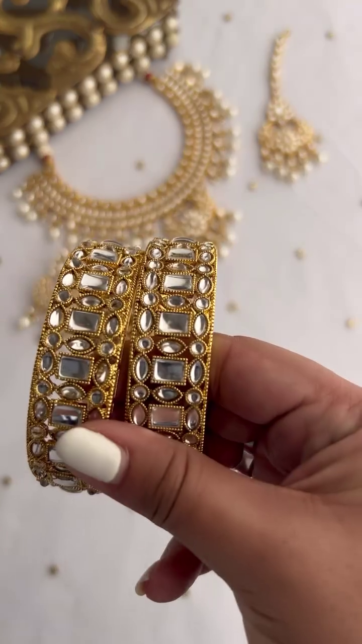 Elegant Gold-Toned Kundan Necklace Set with Pearl Drops