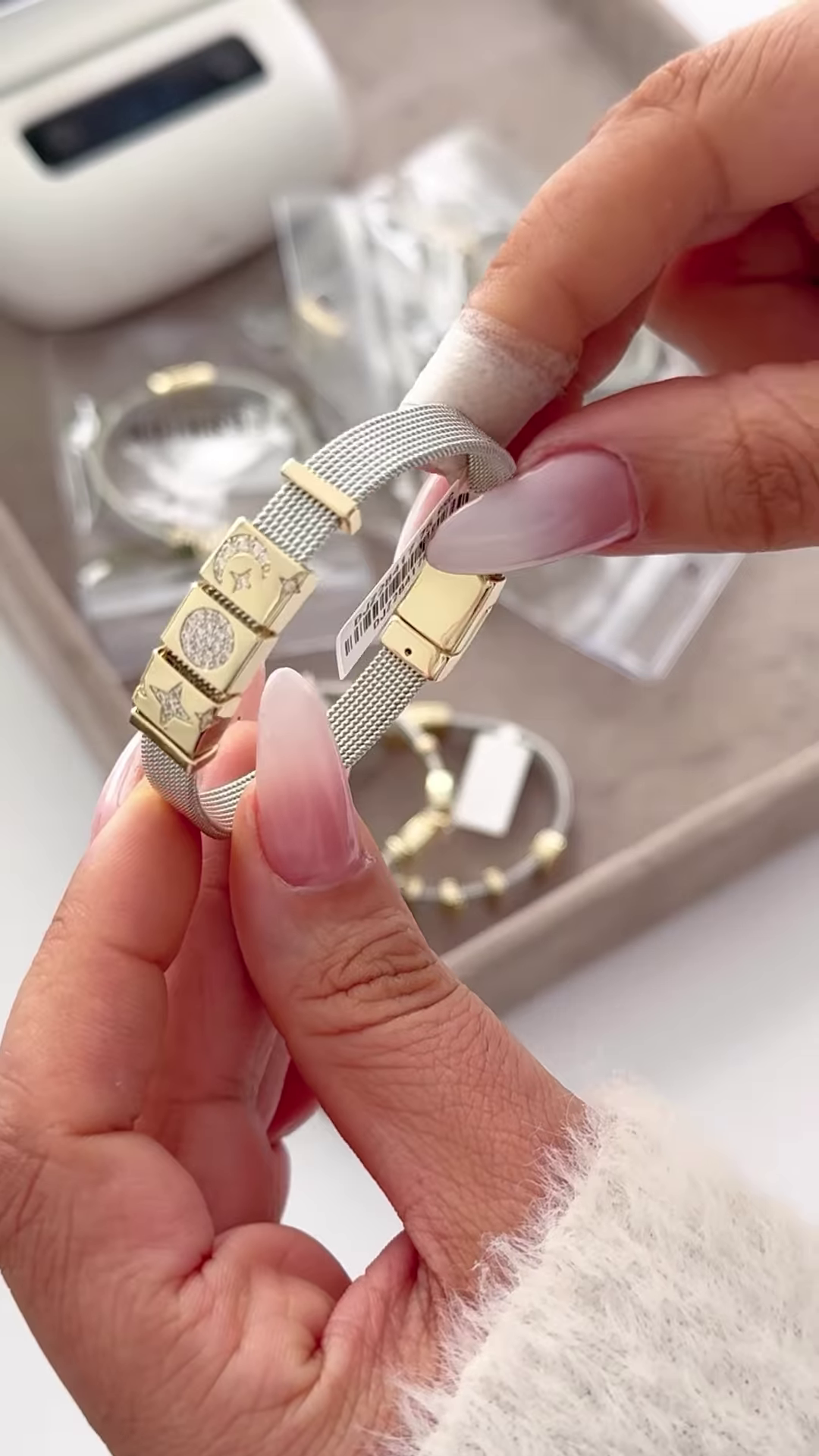 Elegant Silver-Toned Mesh Bracelet with Gold Accents and Crown Charm