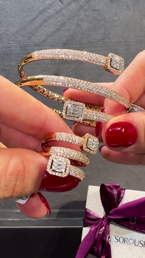 Dazzling Rose Gold-Toned Dual-Bar Bracelet with Pavé Embellishments and Rectangular Gemstones