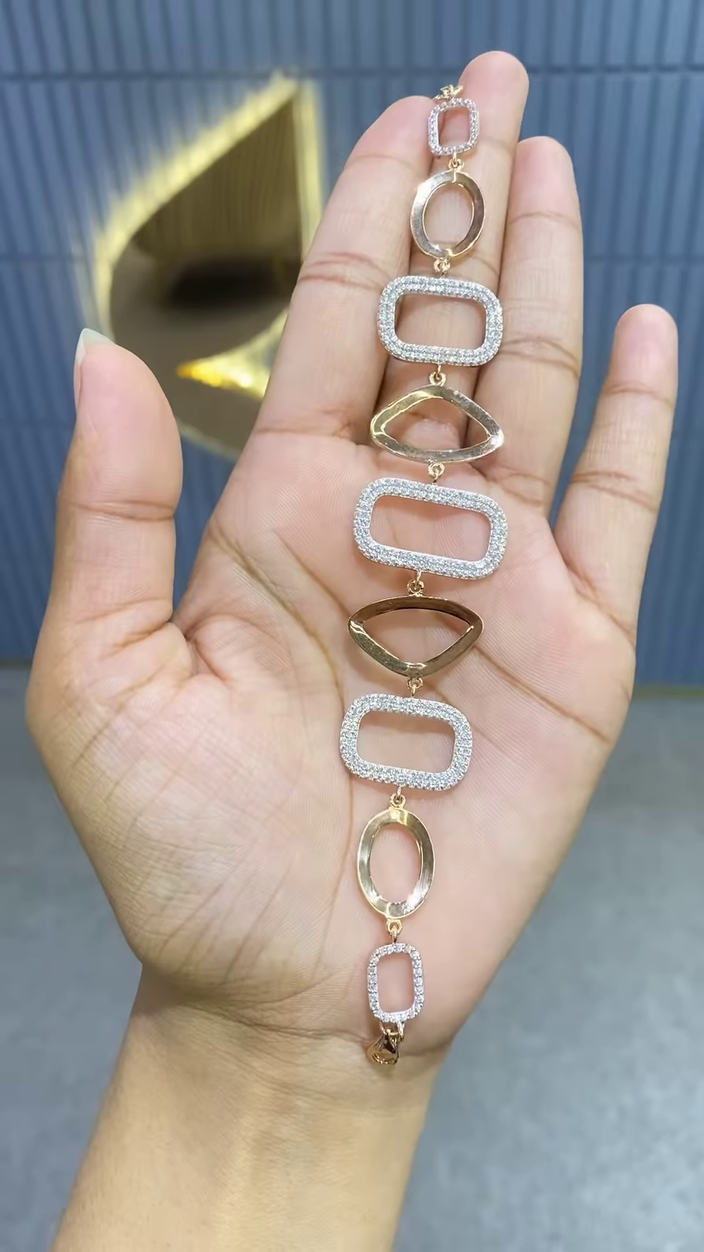 Modern Rose Gold-Toned Bracelet with Geometric Links and Pavé Embellishments