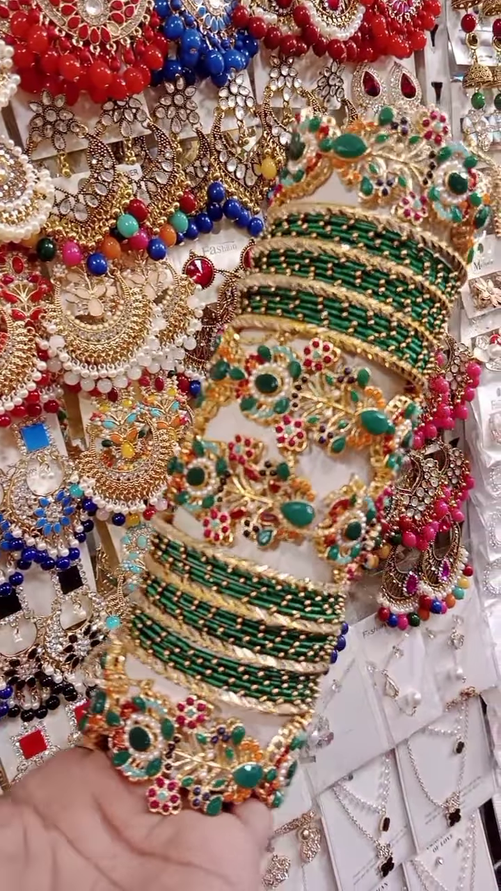 Vibrant Green and Gold-Toned Bangle and Earring Set with Intricate Gemstone Embellishments